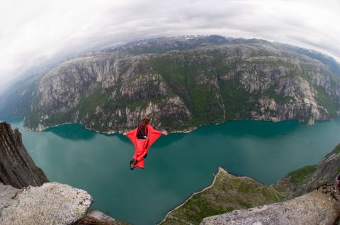 A person in a wingsuit flying