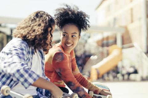 Two young people talking